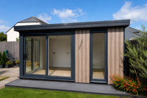 csl-tailored-garden-room-dark-cladding-canopy-composite-decking-kent-001