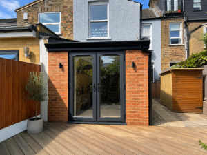 csl-tailored-garden-room-dark-cladding-canopy-decking-margate-012